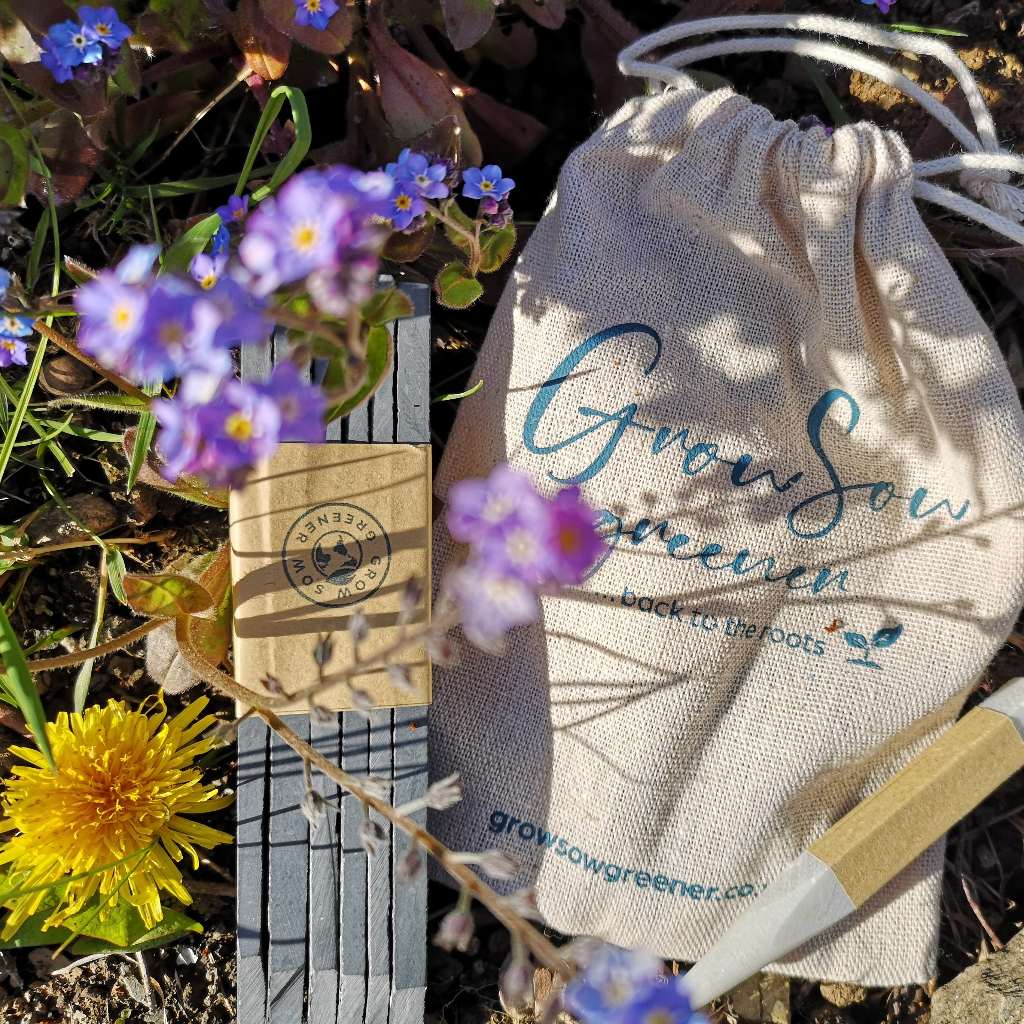 a gift set of 6 slate plant markers, soapstone pen and cotton bag