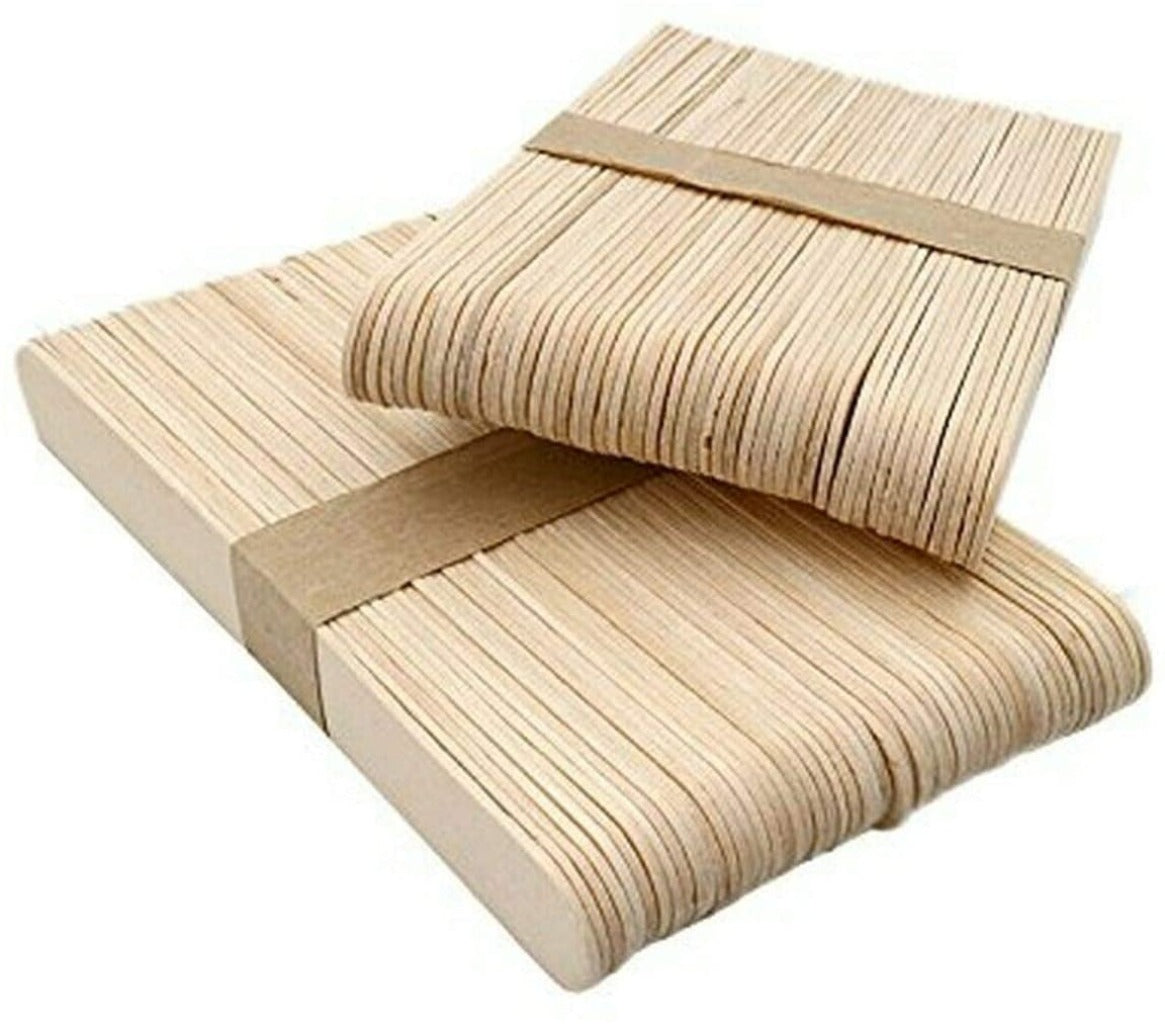 two bundles of light coloured wooden plant markers bound with dark cardboard